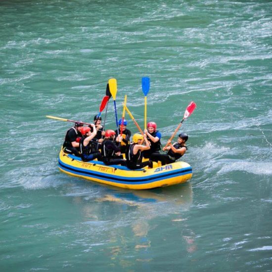 Group of turists rafting on the river, extreme and fun sport at tourist attraction natural park Campania